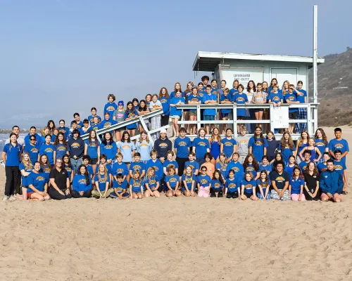 Westside Aquatics Team Photo on the Beach